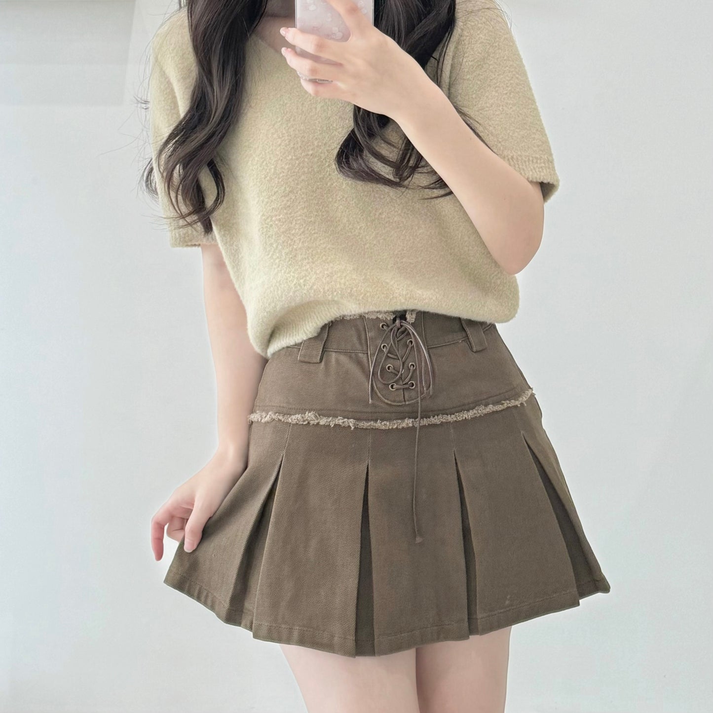 Lace-up pleated skirt