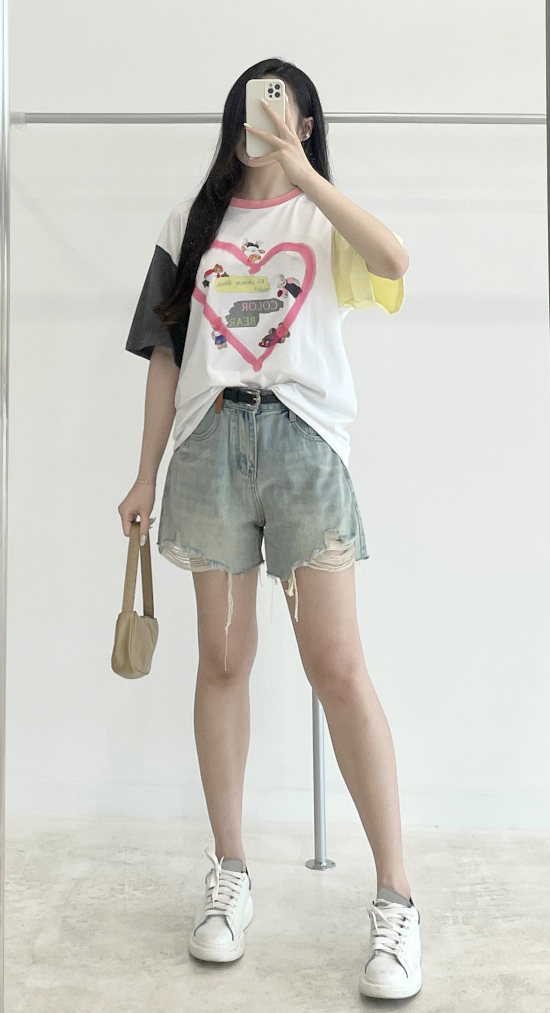 Belted high-waisted denim shorts