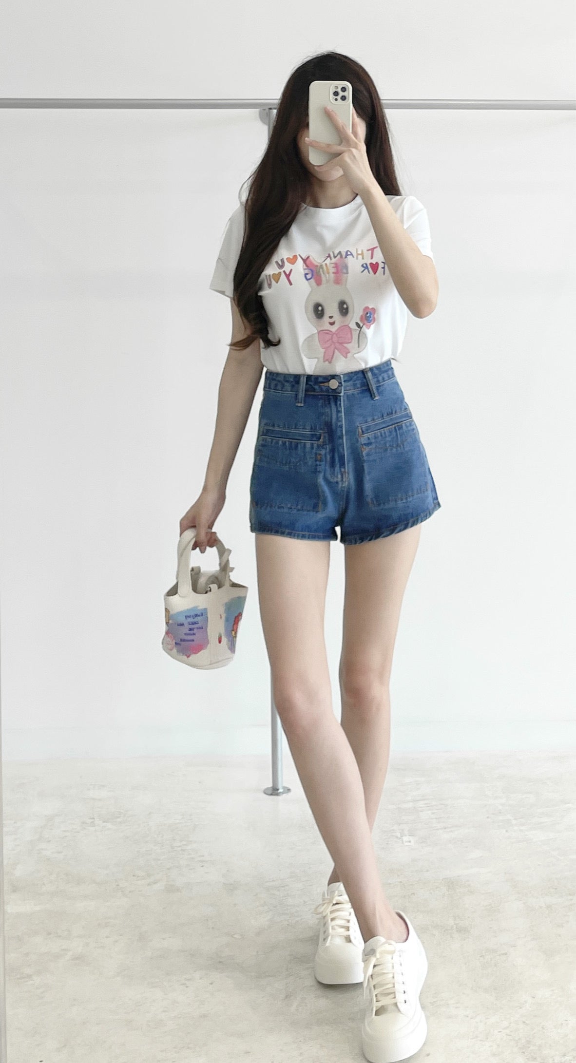 High-waisted stretch denim shorts