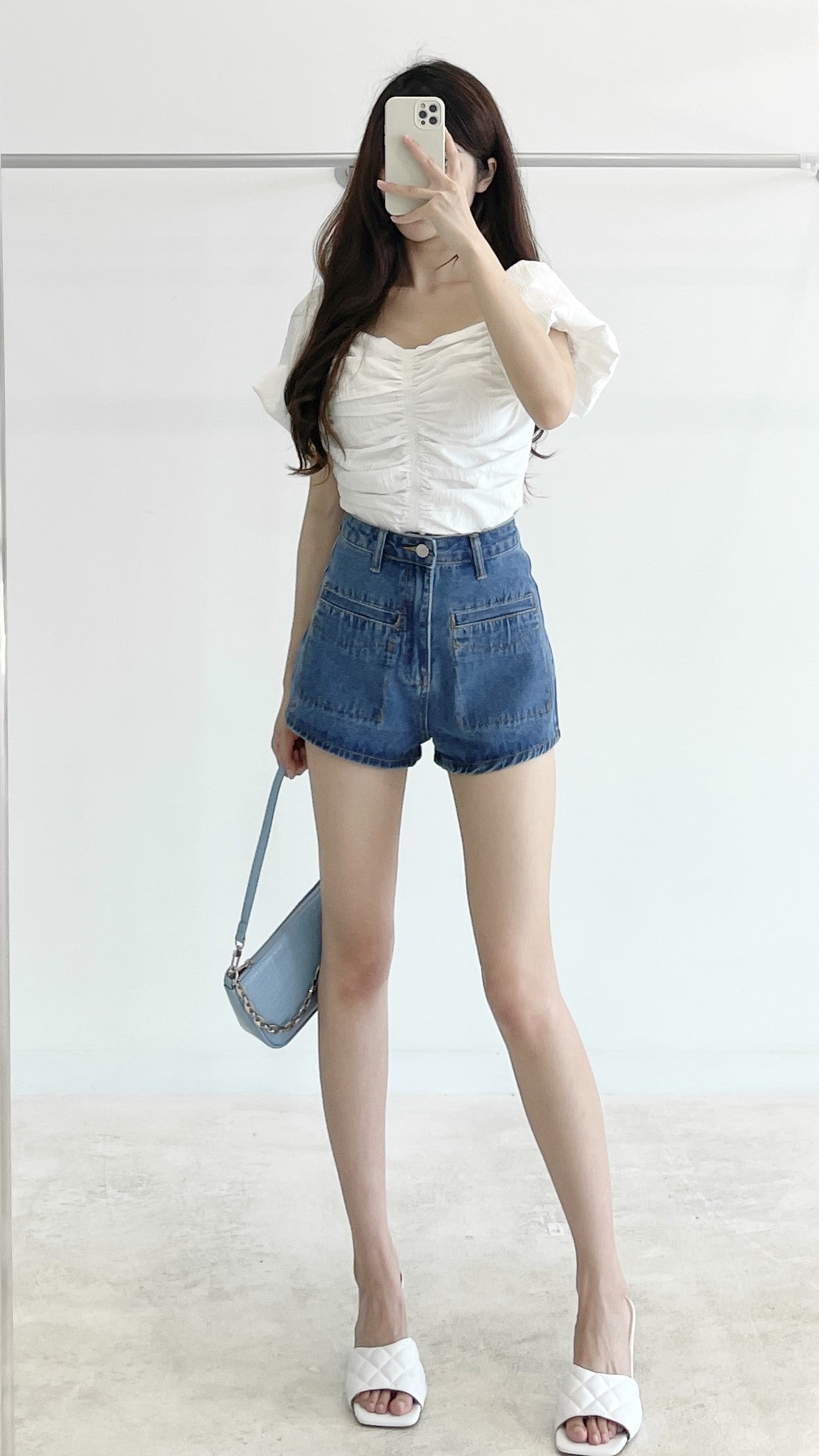 High-waisted stretch denim shorts