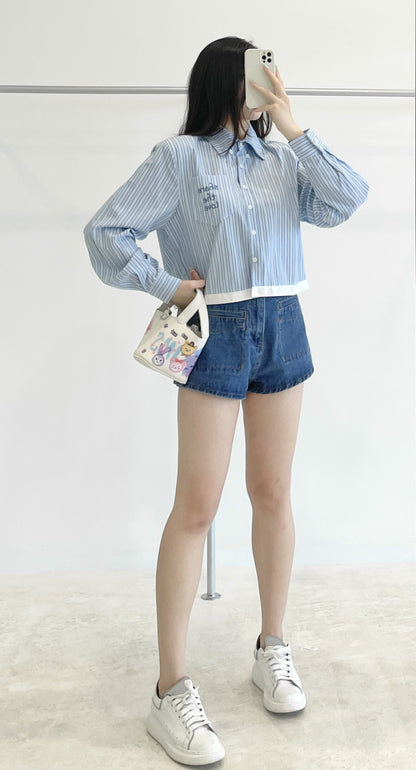 High-waisted stretch denim shorts