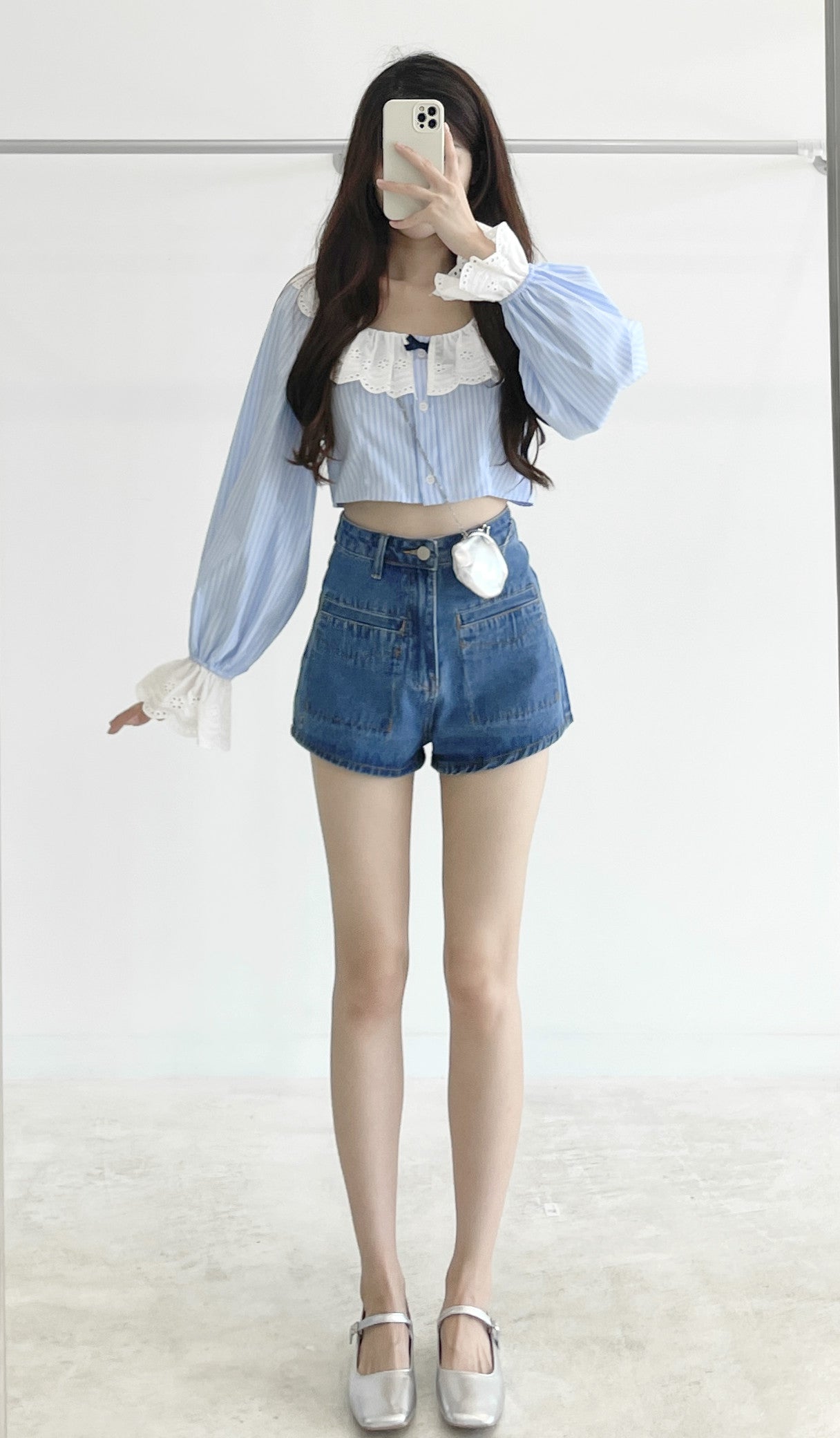 High-waisted stretch denim shorts