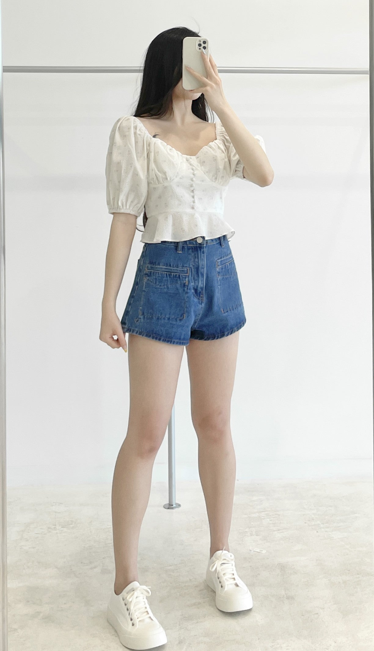 High-waisted stretch denim shorts